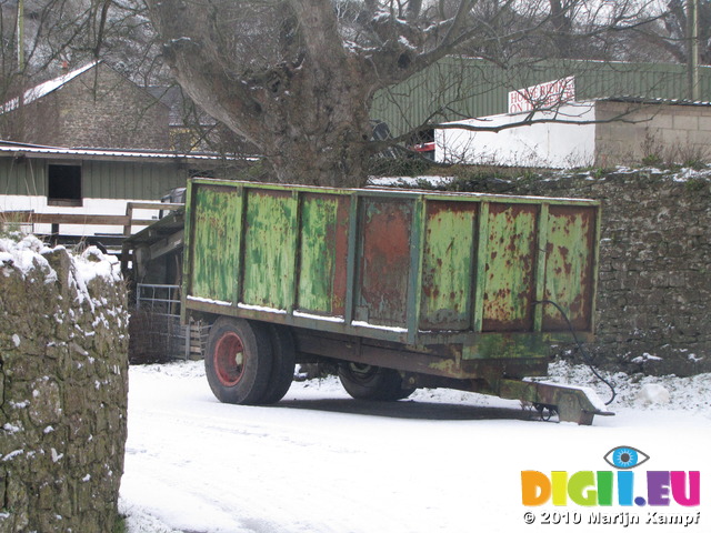 SX12131 Green farm trailer in snow